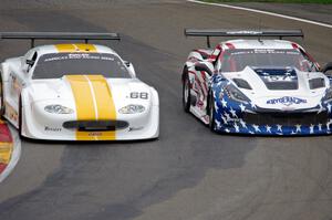 Greg Pickett's Jaguar XKR passes Dave Pintaric's Chevy Corvette