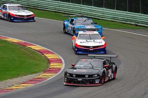 Dillon Machavern's Ford Mustang, Gar Robinson's Chevy Camaro, Tony Buffomante's Ford Mustang and Shane Lewis' Chevy Camaro