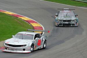 Dick Danielson's Chevy Camaro and Vaughn Gittin, Jr.'s Ford Mustang