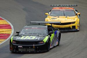 Steven Lustig's Ford Mustang and John Atwell's Chevy Camaro