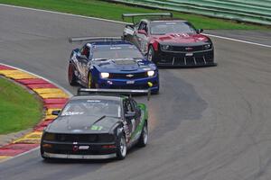 Rich Jones' Ford Mustang, Fernando Seferlis' Chevy Camaro and Bill Baten's Chevy Camaro