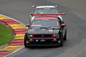 Chuck Cassaro's Ford Mustang and Clint Sawinski's Porsche GT3 Cup