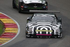 Doug Peterson's Cadillac CTS-V and Mel Shaw's Ford Mustang