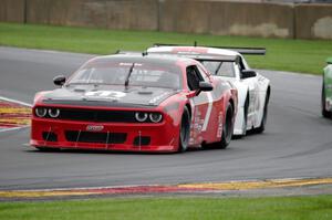 Cameron Lawrence's Dodge Challenger and Tony Ave's Ford Mustang