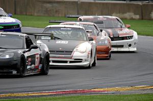 Jason Berkeley's Chevy Corvette, Clint Sawinski's Porsche GT3 Cup, Allan Lewis' Chevy Corvette and Michael McGahern's Chevy Cama