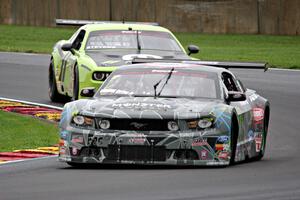 Vaughn Gittin, Jr.'s Ford Mustang and Joe Stevens' Dodge Challenger