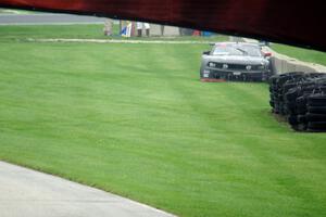 Dillon Machavern's Ford Mustang pulls off just after turn 8.