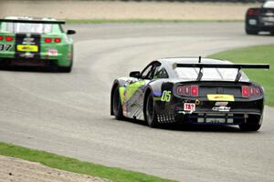 Steven Lustig's Ford Mustang chases Jordan Bernloehr's Chevy Camaro