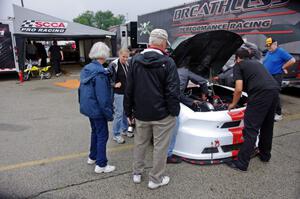 Tony Ave's Ford Mustang goes through post-race tech inspection.