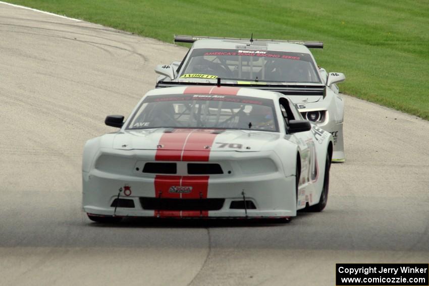 Tony Ave's Ford Mustang and Adam Andretti's Chevy Camaro