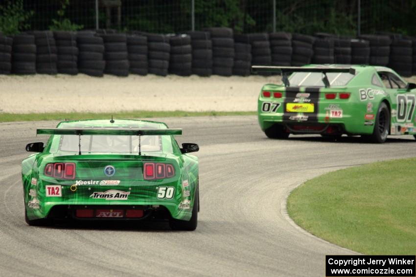 Bruce Nesbitt's Ford Mustang chases Jordan Bernloehr's Chevy Camaro