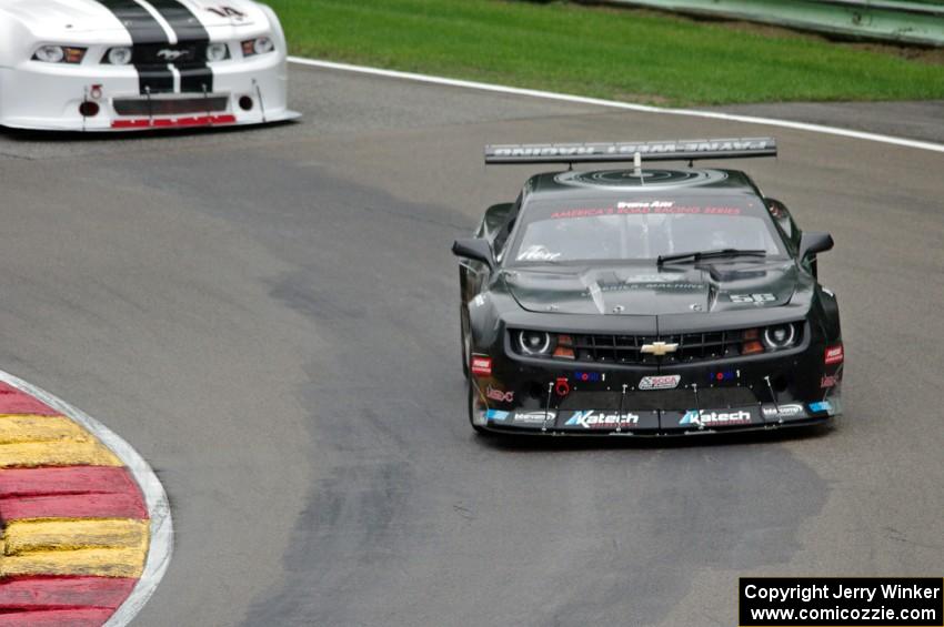 Tom West's Chevy Camaro and Joe Ebben's Ford Mustang