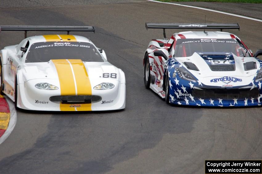 Greg Pickett's Jaguar XKR passes Dave Pintaric's Chevy Corvette