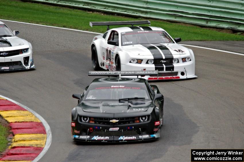 Tom West's Chevy Camaro and Joe Ebben's Ford Mustang