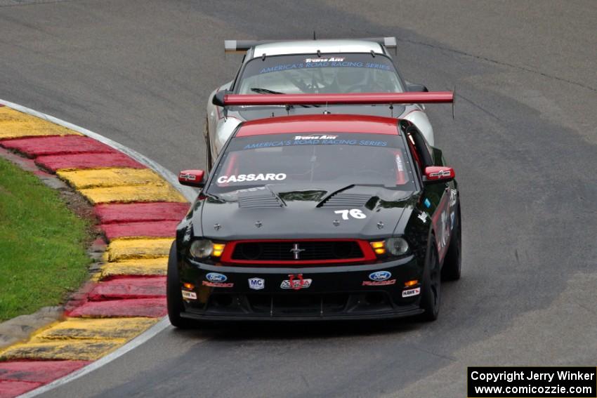 Chuck Cassaro's Ford Mustang and Clint Sawinski's Porsche GT3 Cup