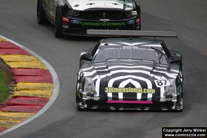 Doug Peterson's Cadillac CTS-V and Mel Shaw's Ford Mustang