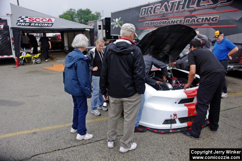 Tony Ave's Ford Mustang goes through post-race tech inspection.