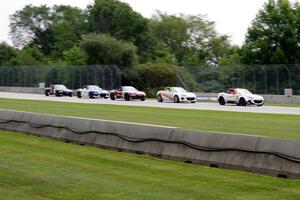 John Dean II, Nathanial Sparks, Drake Kemper, Patrick Gallagher and Dean Copeland, all in Mazda MX-5s.