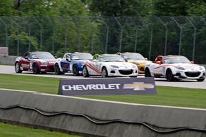 Nathanial Sparks, Timothy Paul, Peter Portante and Kyle Loustaunau, all in Mazda MX-5s.
