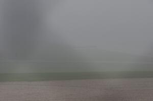 The second race starts under yellow flag conditions, behind the pace car, due to thick fog.