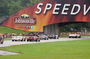 MX-5s head under the Johnsonville bridge into the carousel.