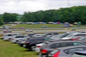 Matt Plumb / Hugh Plumb Porsche 911 grabs the early lead on the first lap.