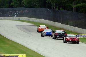 The lead four ST cars head into turn 5.