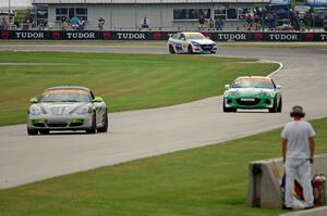 Connor Bloum / Greg Strelzoff Porsche Cayman, Andrew Carbonell / Liam Dwyer Mazda MX-5 and Andrie Hartanto /Tyler Cooke BMW 328i