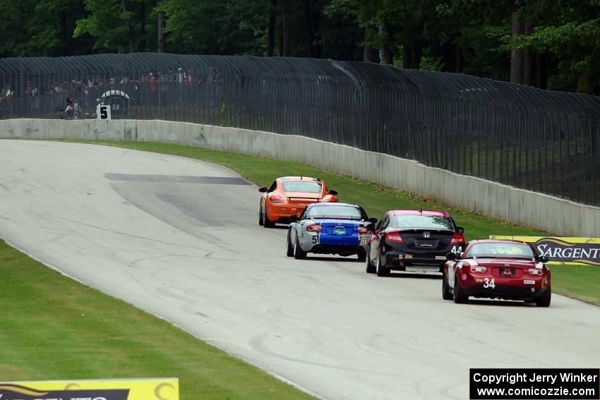 The lead four ST cars head into turn 5.