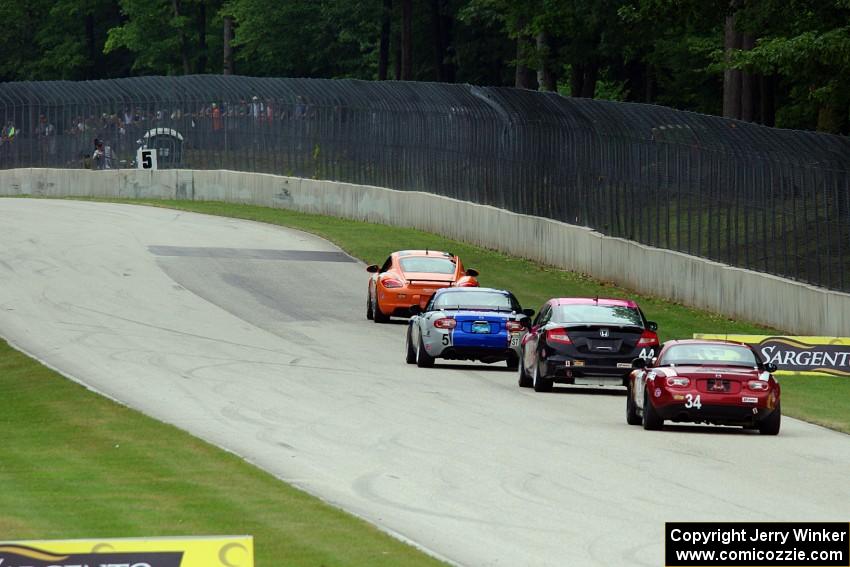 The lead four ST cars head into turn 5.