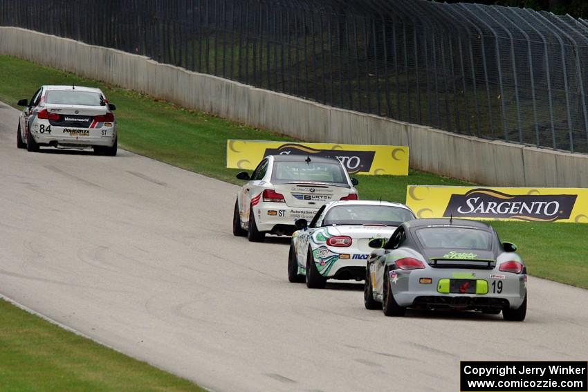 The next four ST cars head into turn 5.