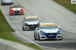 Andrie Hartanto / Tyler Cooke and James Clay / Jason Briedis BMW 328is with Paul Holton / Kyle Gimple Audi S3