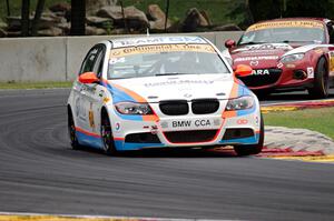 Ted Giovanis / David Murry BMW 328i and Christian Szymczak / Justin Piscitell Mazda MX-5