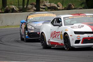 Martin Barkey / Kyle Marcelli Chevrolet Camaro Z/28.R and Greg Liefooghe / Eric Zimmermann Porsche Cayman