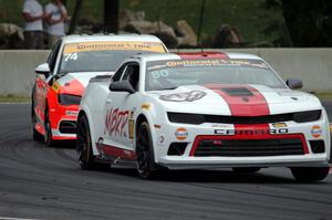 Martin Barkey / Kyle Marcelli Chevrolet Camaro Z/28.R and Jim McGuire / Nico Rondet Audi S3