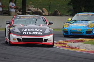 Nicolas Hammann / Steven Doherty Nissan 370Z and Matt Plumb / Hugh Plumb Porsche 911
