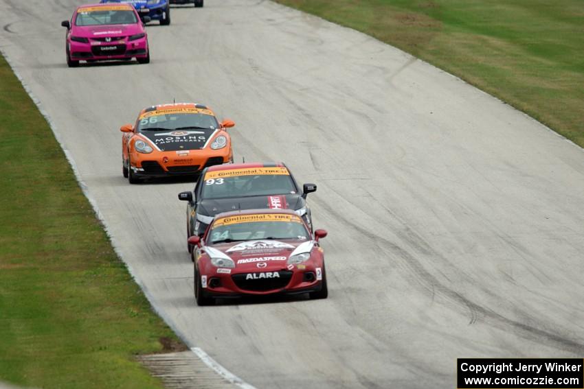 The ST leaders come down the hill into turn 8.