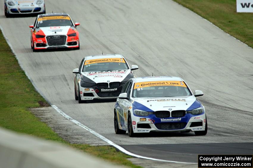 Andrie Hartanto / Tyler Cooke and James Clay / Jason Briedis BMW 328is with Paul Holton / Kyle Gimple Audi S3