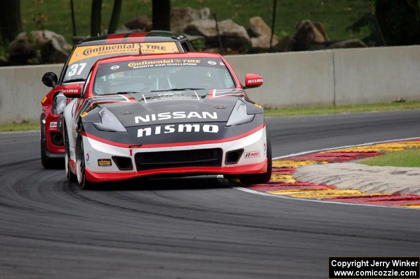 B.J. Zacharias / Brad Jaeger Nissan 370Z and Zack Meyer / Stephen Simpson MINI Cooper JCW