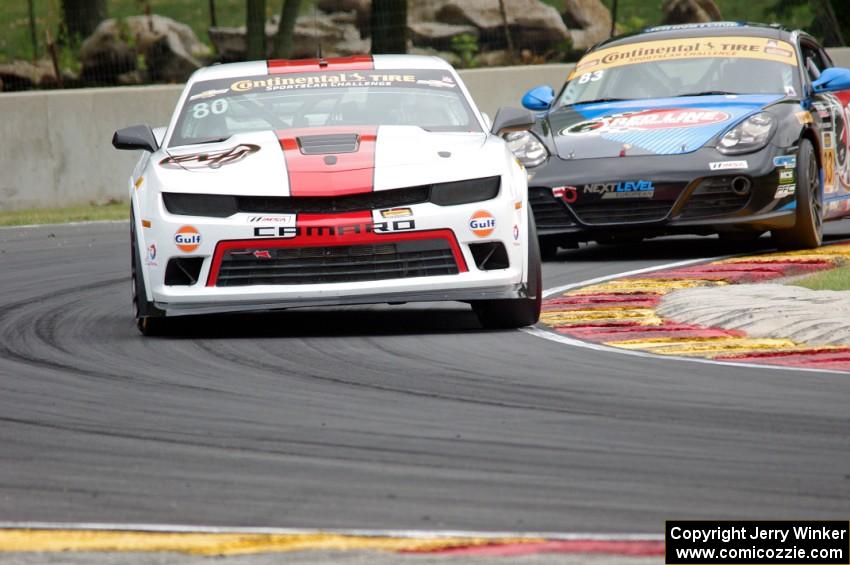 Martin Barkey / Kyle Marcelli Chevrolet Camaro Z/28.R and Greg Liefooghe / Eric Zimmermann Porsche Cayman