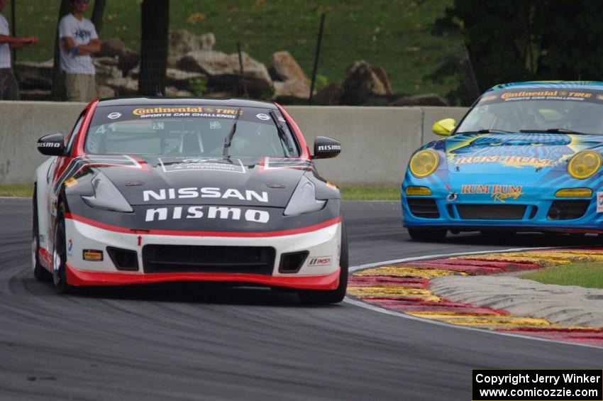 Nicolas Hammann / Steven Doherty Nissan 370Z and Matt Plumb / Hugh Plumb Porsche 911