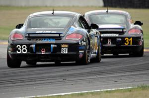 Dan Rogers / Seth Thomas Porsche Cayman chases the Ethan Low / Jason Rabe Porsche Cayman