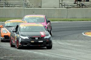 Chad Gilsinger / Ryan Eversley Honda Civic Si, Jeff Mosing / Eric Foss Porsche Cayman and Sarah Cattaneo / Owen Trinkler Honda