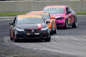 Chad Gilsinger / Ryan Eversley Honda Civic Si, Jeff Mosing / Eric Foss Porsche Cayman and Sarah Cattaneo / Owen Trinkler Honda