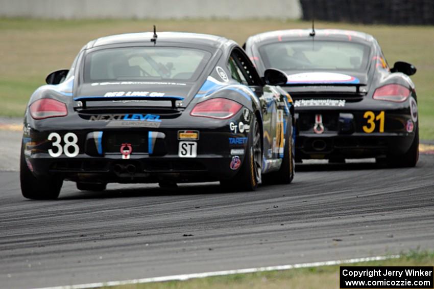Dan Rogers / Seth Thomas Porsche Cayman chases the Ethan Low / Jason Rabe Porsche Cayman