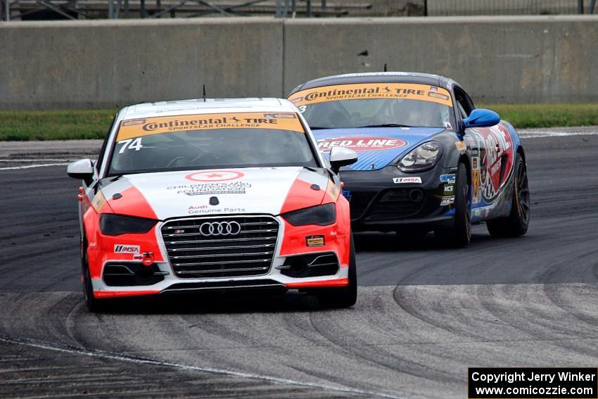Jim McGuire / Nico Rondet Audi S3 and Greg Liefooghe / Eric Zimmermann Porsche Cayman