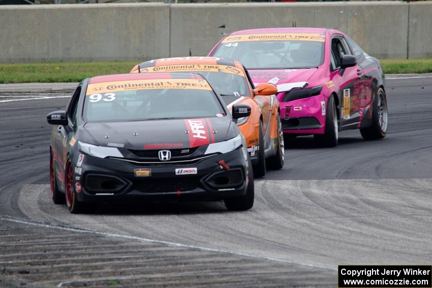 Chad Gilsinger / Ryan Eversley Honda Civic Si, Jeff Mosing / Eric Foss Porsche Cayman and Sarah Cattaneo / Owen Trinkler Honda