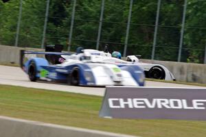 Michal Chlumecky's Panoz Élan DP-02 tags the outside wall at turn 2.