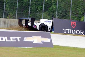 Michal Chlumecky's Panoz Élan DP-02 tags the outside wall at turn 2.