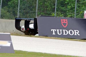 Michal Chlumecky's Panoz Élan DP-02 tags the outside wall at turn 2.